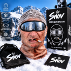 Cagoule de ski Snov à visage réaliste avec sa boîte et sa pochette, dans la neige